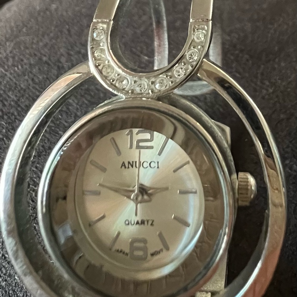 Anucci Silver Quartz Bangle Watch. Woman’s. NEEDS BATTERY.